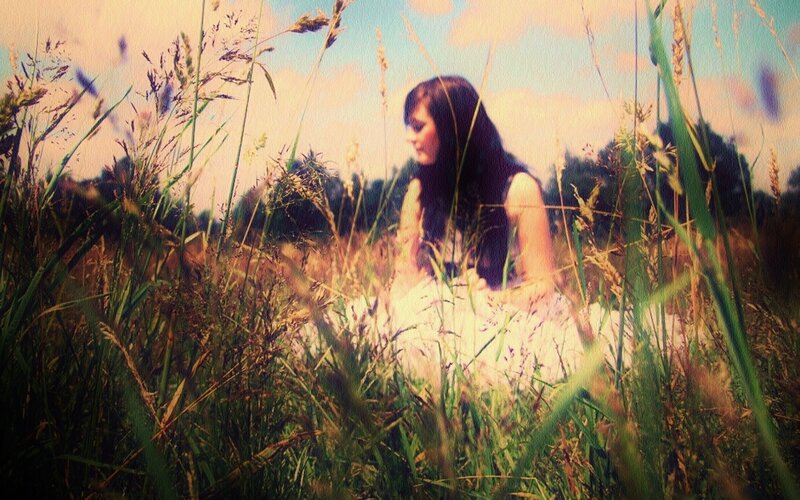 Woman in a Field — Green, Serene, Afternoon