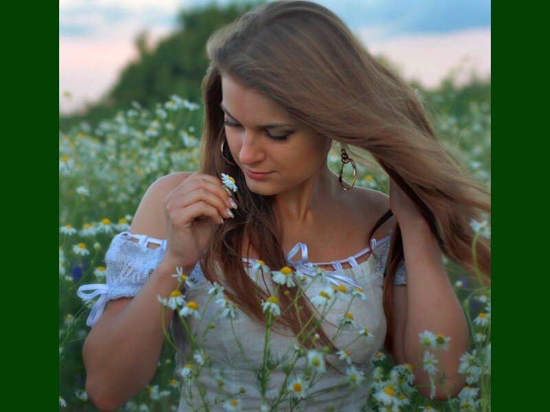 woman in a field of daisies