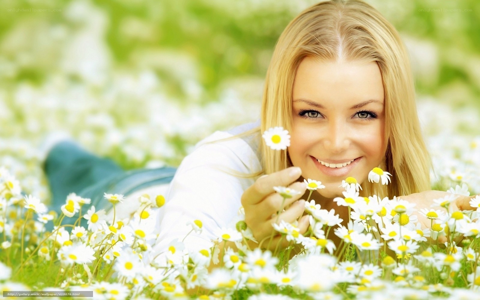 Woman in a field of daisies