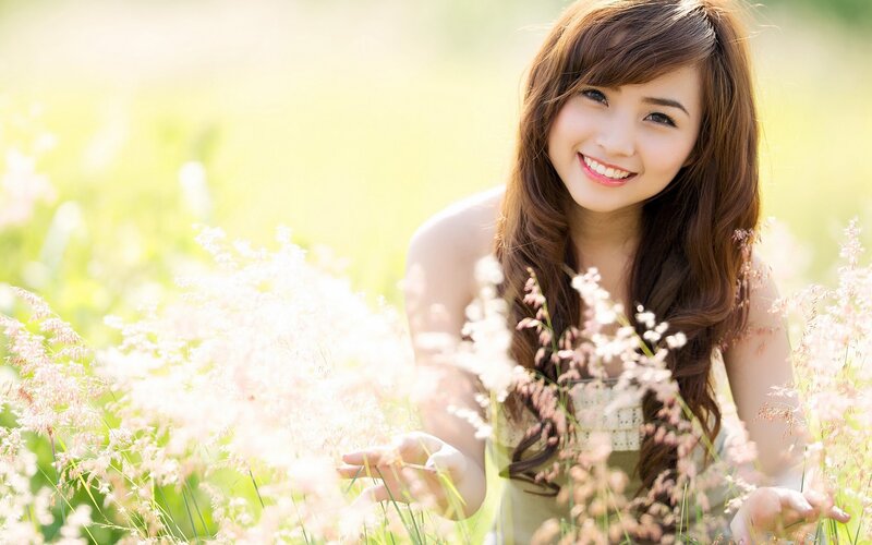 woman in a field of flowers