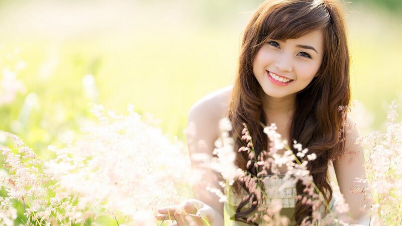 woman in a field of flowers