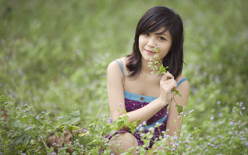 woman in a field of flowers