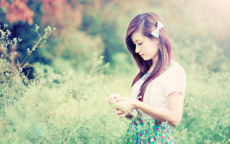 woman in a field of flowers
