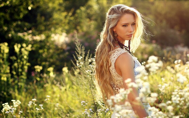 woman in a field of flowers