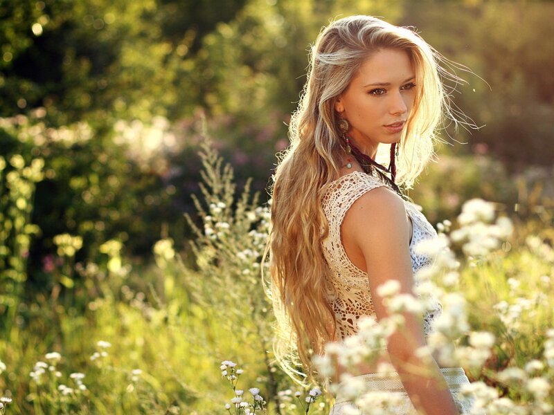 woman in a field of flowers