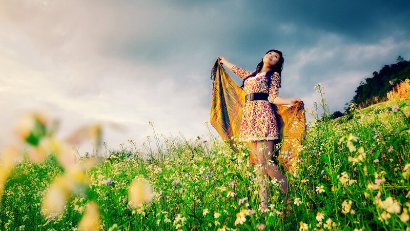Woman in a field of flowers