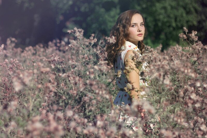 woman in a field of flowers