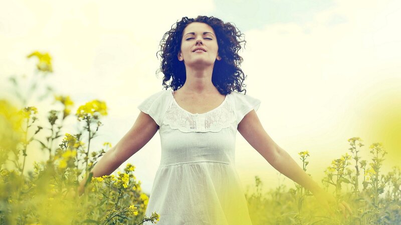 woman in a field of flowers
