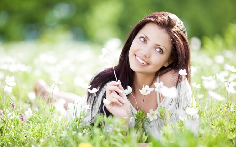 woman in a field of flowers
