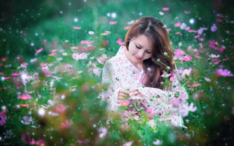 Woman in a field of flowers