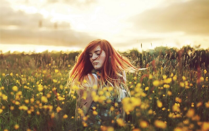 woman in a field of flowers