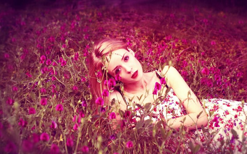 woman in a field of flowers