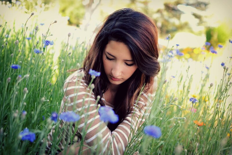 woman in a field of flowers
