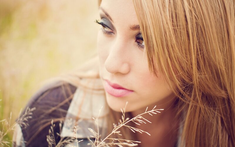 woman in a field of grass