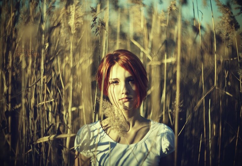 woman in a field of reeds
