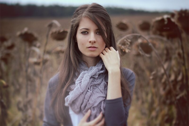woman in a field of sunflowers