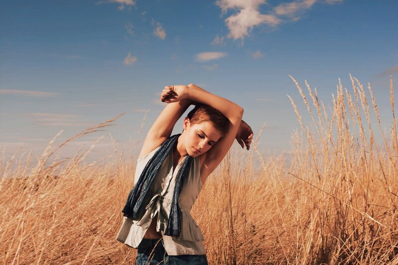 Woman in a field of tall grass