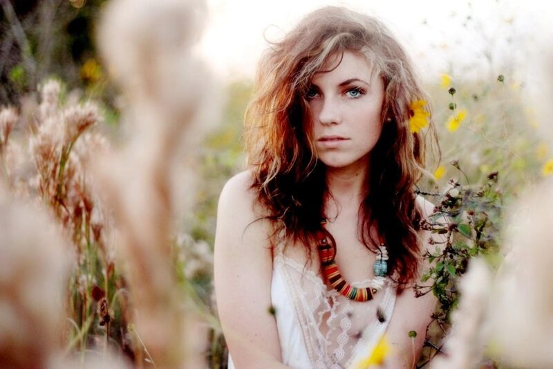 woman in a field of wildflowers