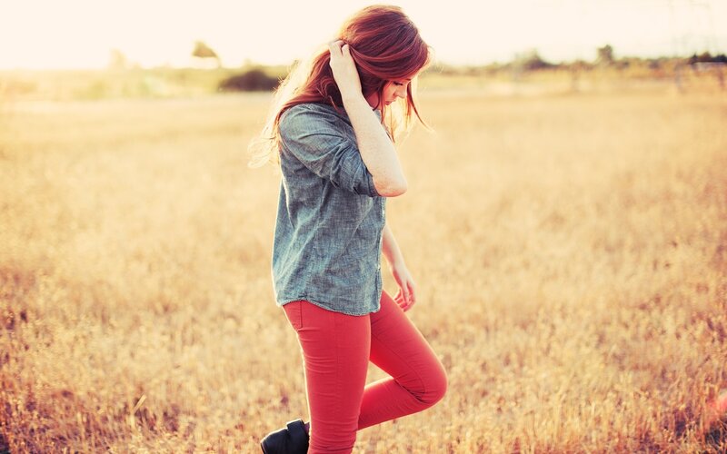 Woman in a Field — Red, Serene
