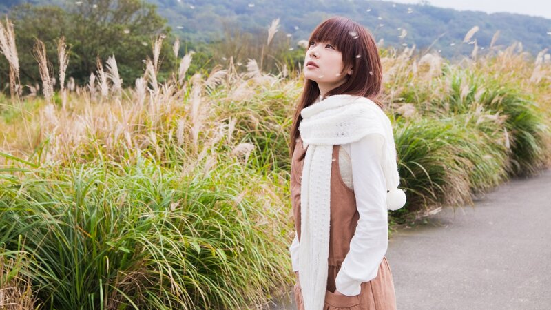Woman in a Field — White, Serene, Autumn