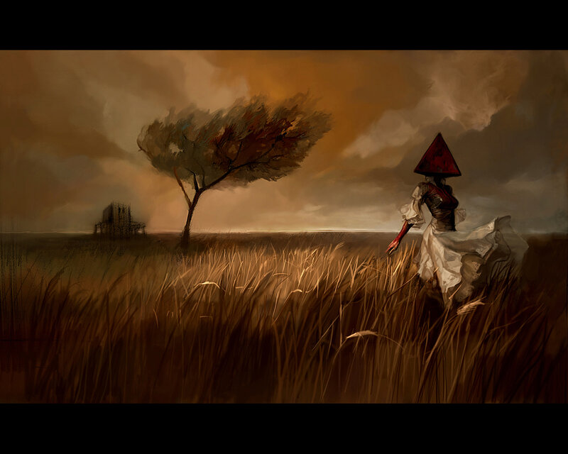 Woman in a field with a red hat