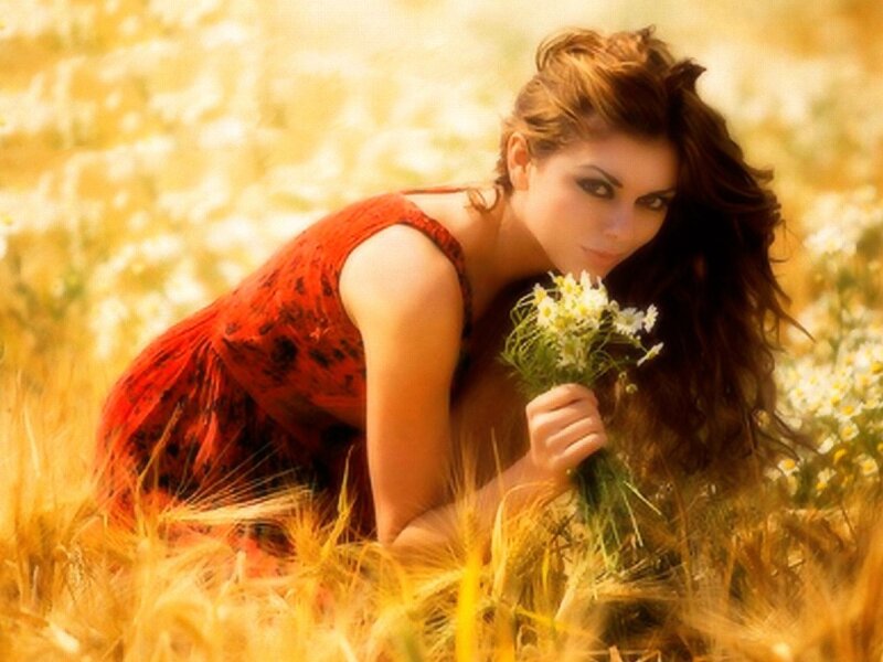 Woman in a field with flowers