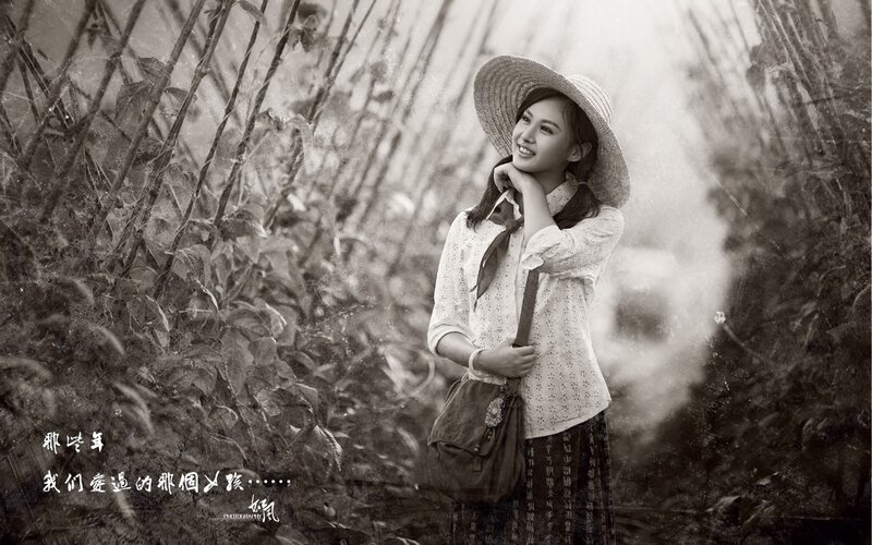 woman in a field with hat