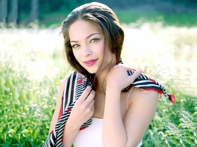 woman in a field with scarf