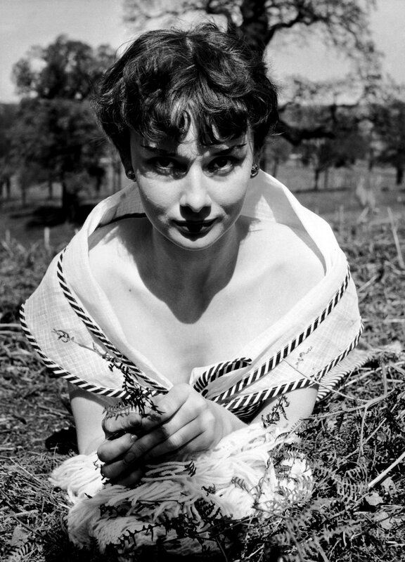 Woman in a field with scarf
