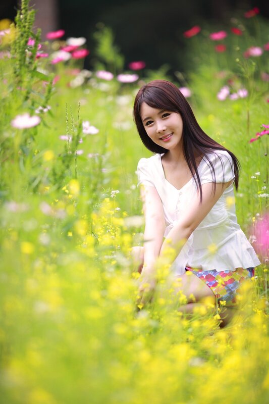 woman in a flower field