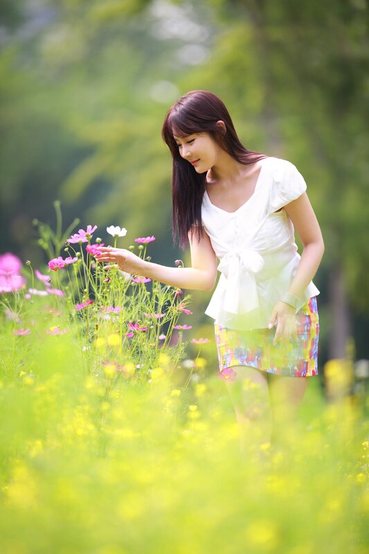 woman in a flower field