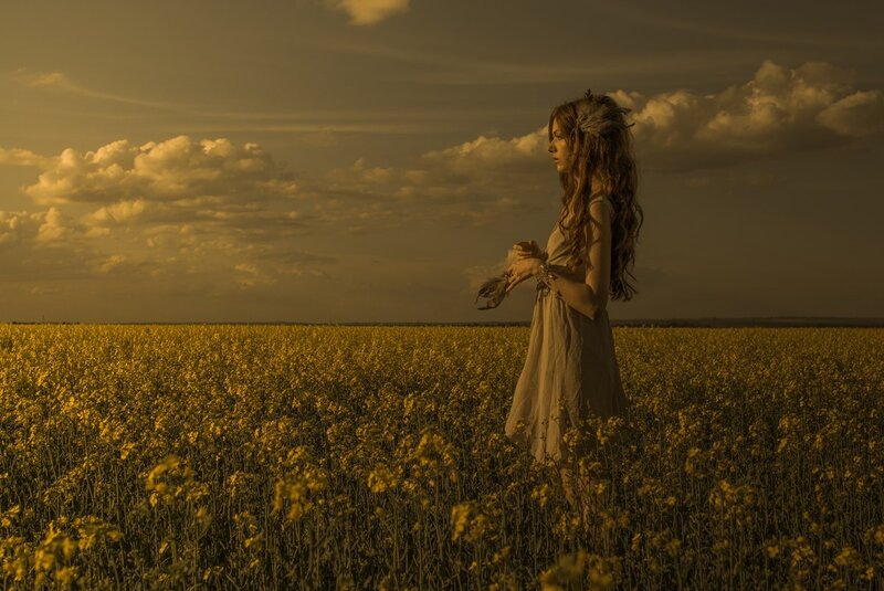 Woman in a Flower Field — Yellow, Dramatic