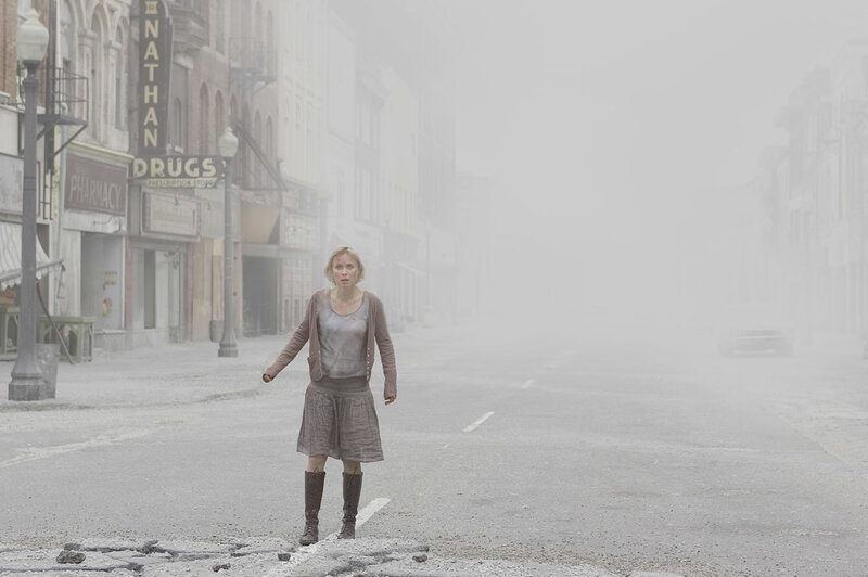 woman in a foggy street