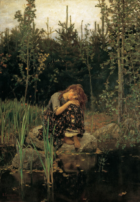 Woman in a forest by water