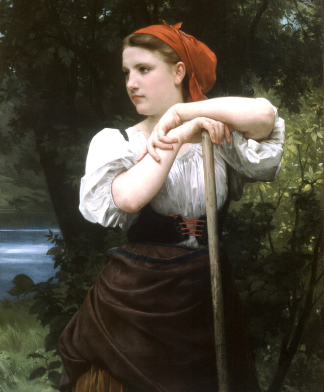 Woman in a forest with a staff