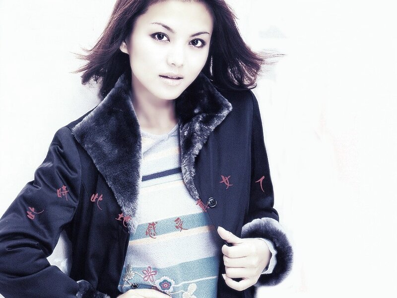 woman in a fur-collared coat