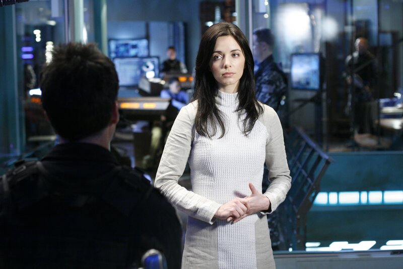 Woman in a futuristic control room