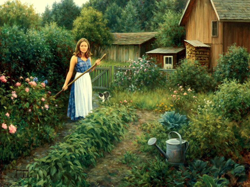 Woman in a garden with cat