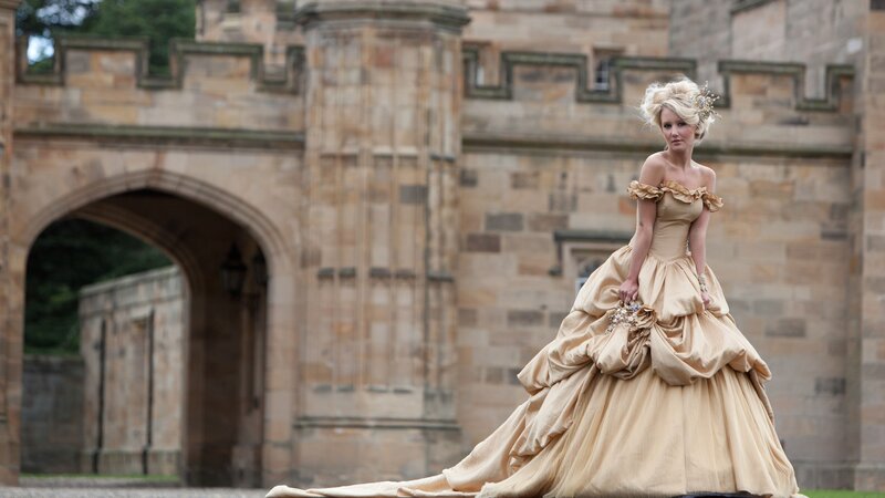 woman in a gold gown