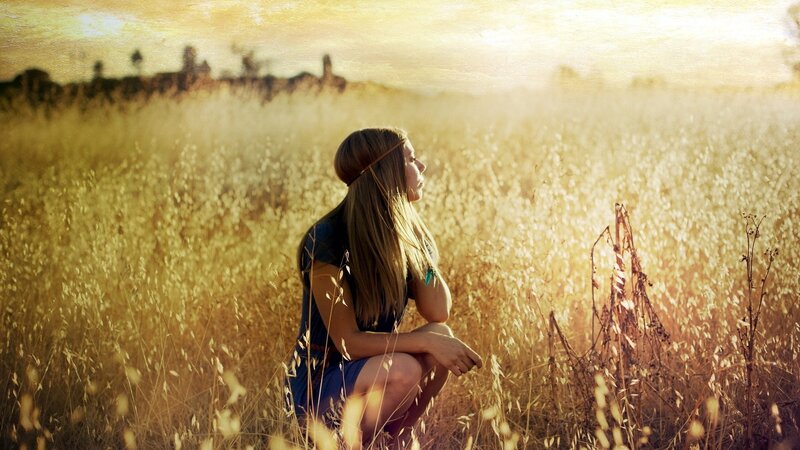 woman in a golden field