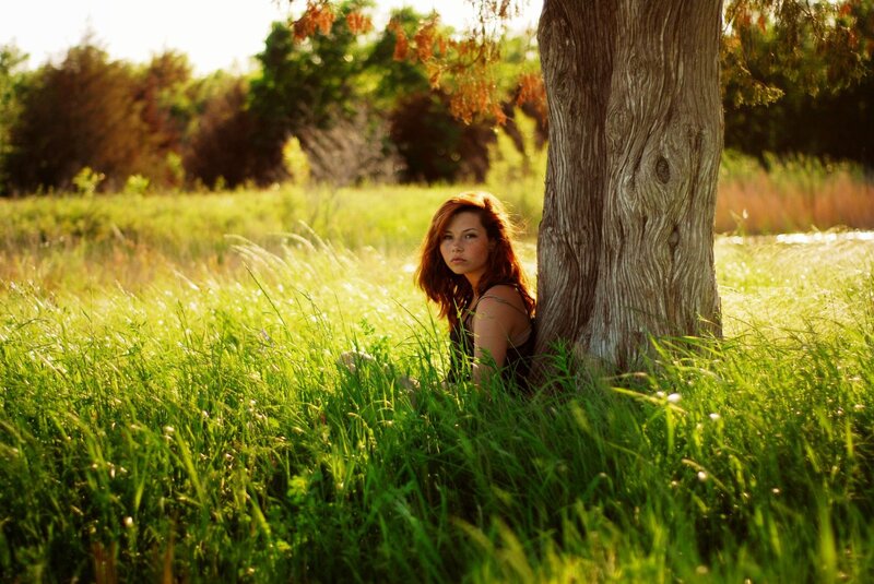 Woman in a grassy field