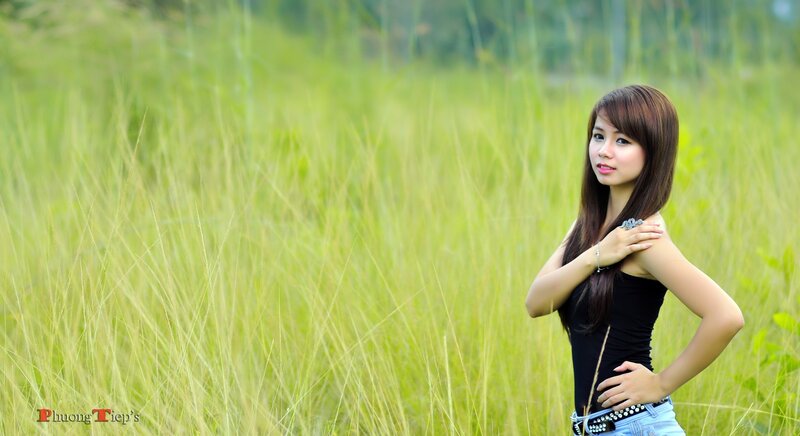 woman in a grassy field