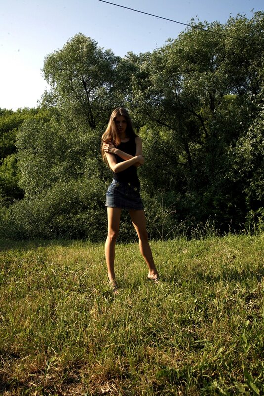 Woman in a grassy field