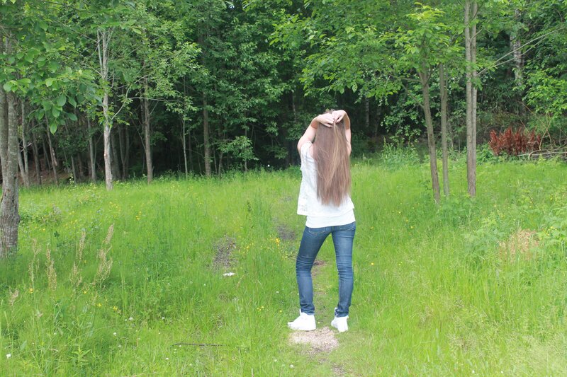 Woman in a grassy field