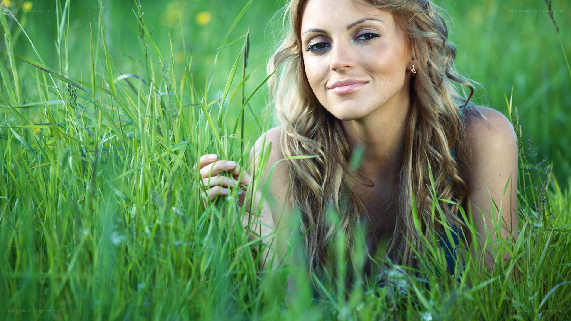 woman in a grassy field