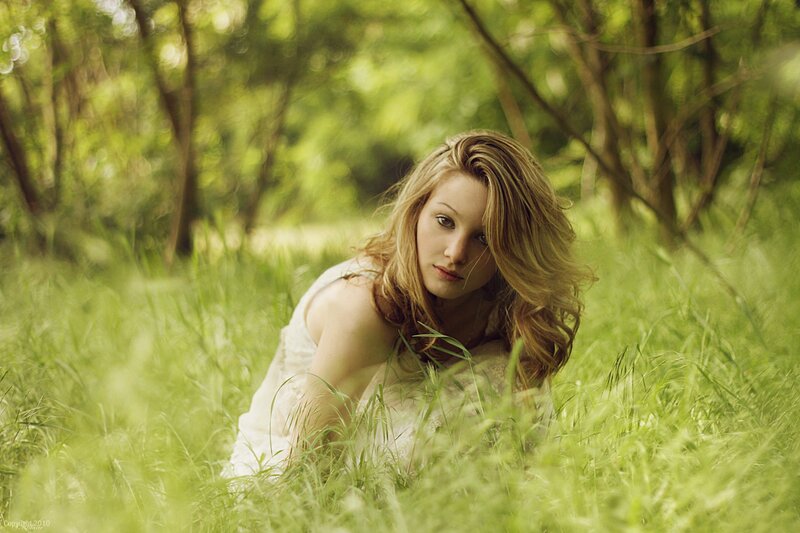 woman in a grassy field