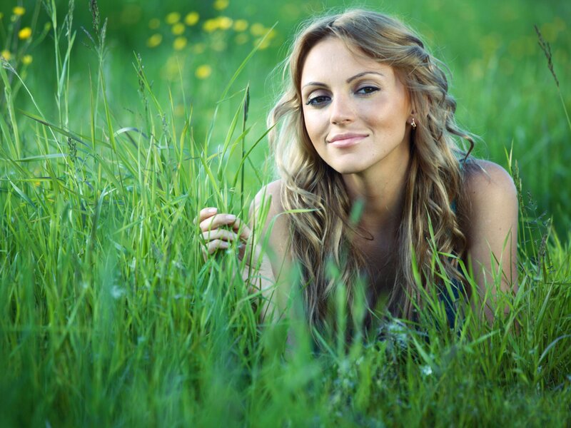 woman in a grassy field