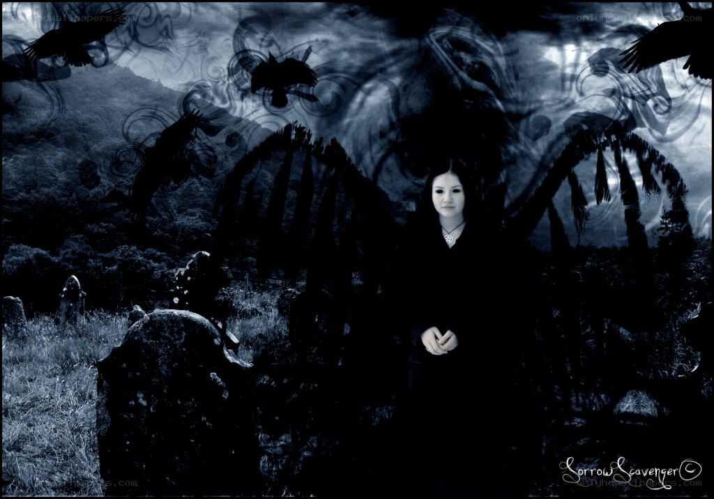 woman in a graveyard with crows