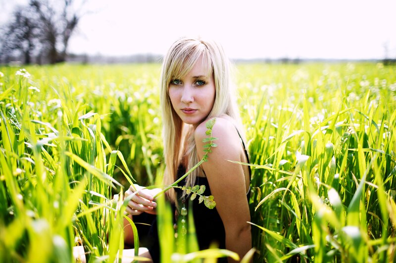 woman in a green field