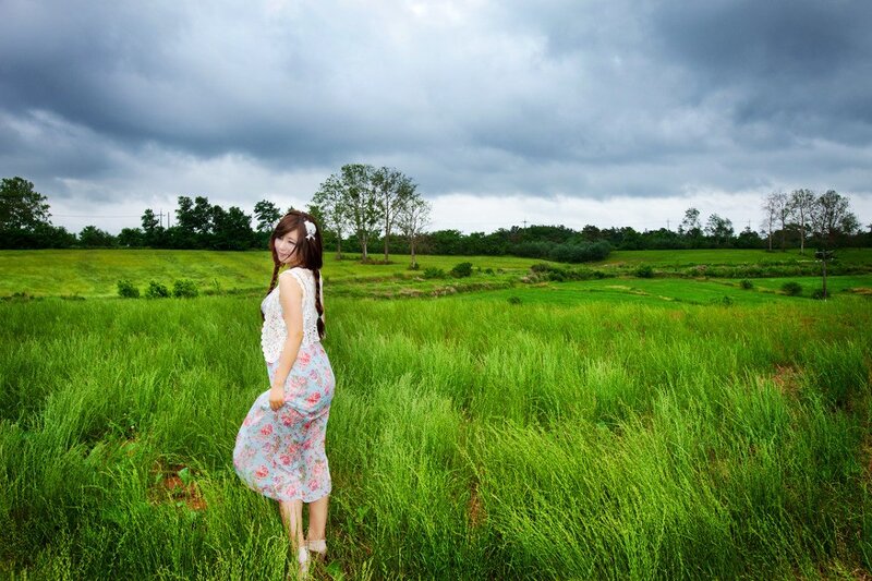 Woman in a green field